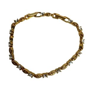 Vintage Avon Gold Tone Filigree Tennis Bracelet Clear Rhinestones Extender